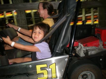 Karis and Mommy riding go karts
